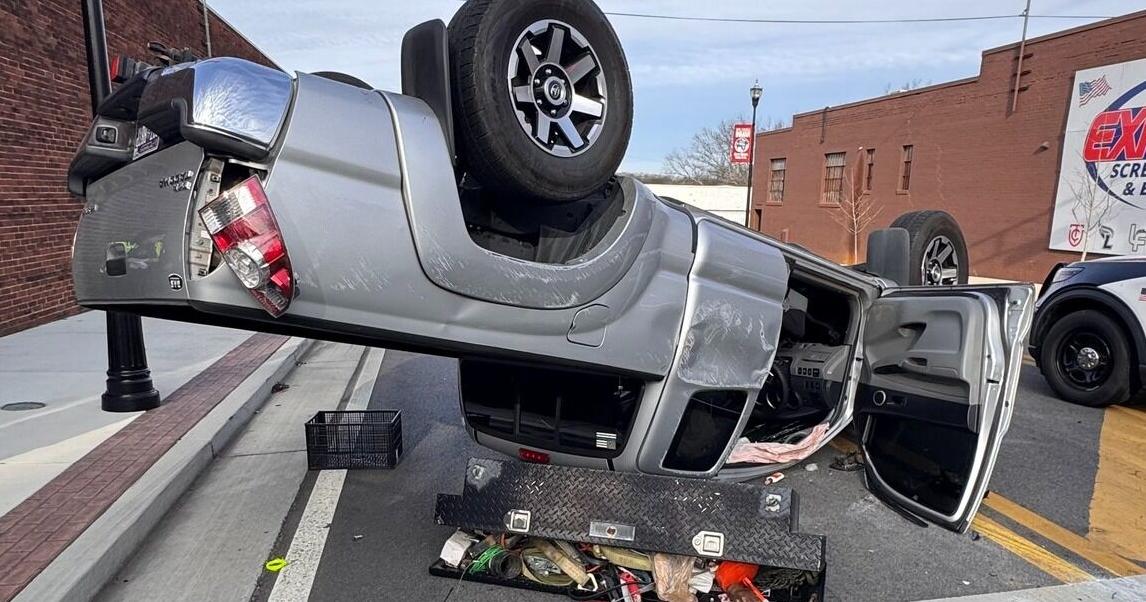 Truck flips, 2 people injured in Cleveland crash