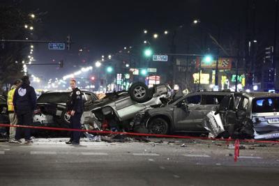 A vehicle driving the wrong way on a Chicago street causes high-speed crash, killing its occupants and injuring 16, police say