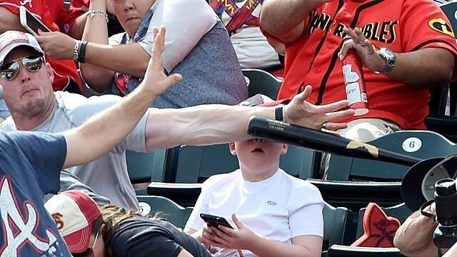 Fan saves from getting by baseball bat | local3news.com