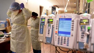 Officials prep for Omicron, US hospitals still battling severe Delta variant infections