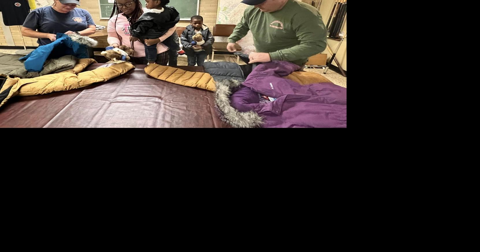 Family reunites with first responders after house fire displaced 10