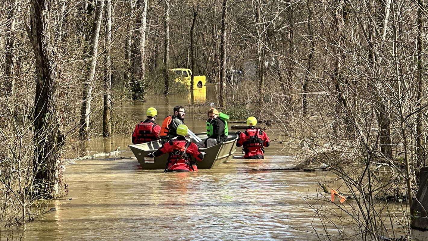 Net Flood Rescue UPDATE: Crews rescue 10 people, 14 dogs after homeless encampment ...