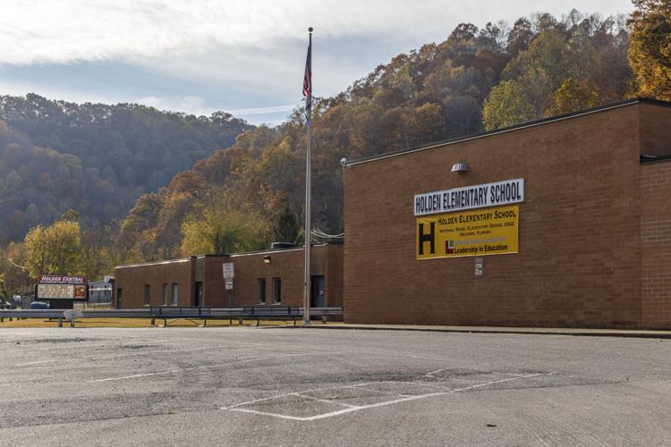 Superintendent questioned over board attorney, Holden principal News