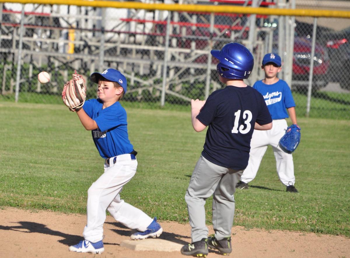 20200701-log-little league roundup play at second braydon neece elijah keener