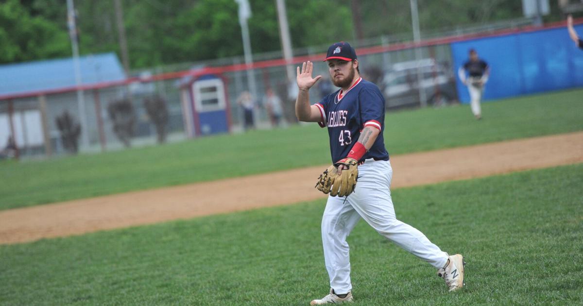 Man rallies after rain delay, advances to sectional title Sports