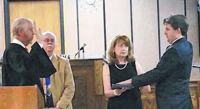 Workman takes Oath of Office News loganbanner com