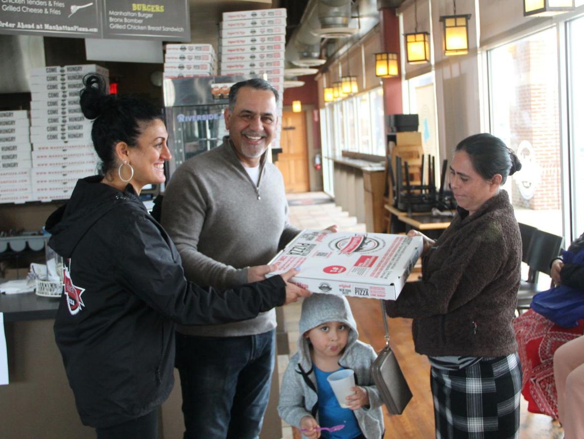 Manhattan Pizza donates pizzas, produce and other essentials ...