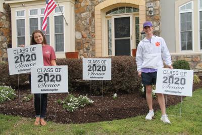 Leesburg High School Seniors Distribute Signs To Unify Classmates