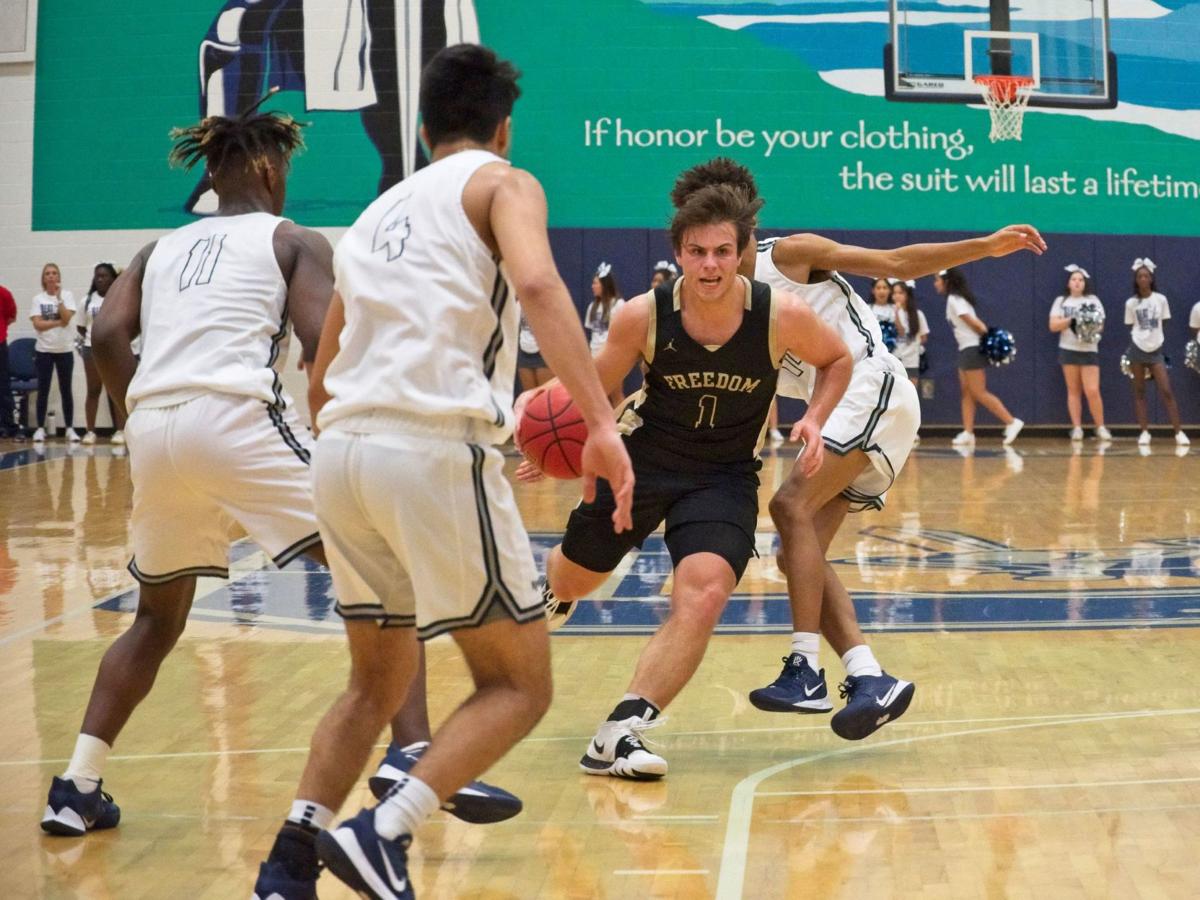 Freedom John Champe Split Varsity Basketball Doubleheader Sports Loudountimes Com
