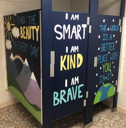 Photos: Dominion High School students paint positive messages to ...