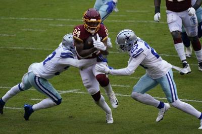 Antonio Gibson of the Washington Football Team runs for a touchdown