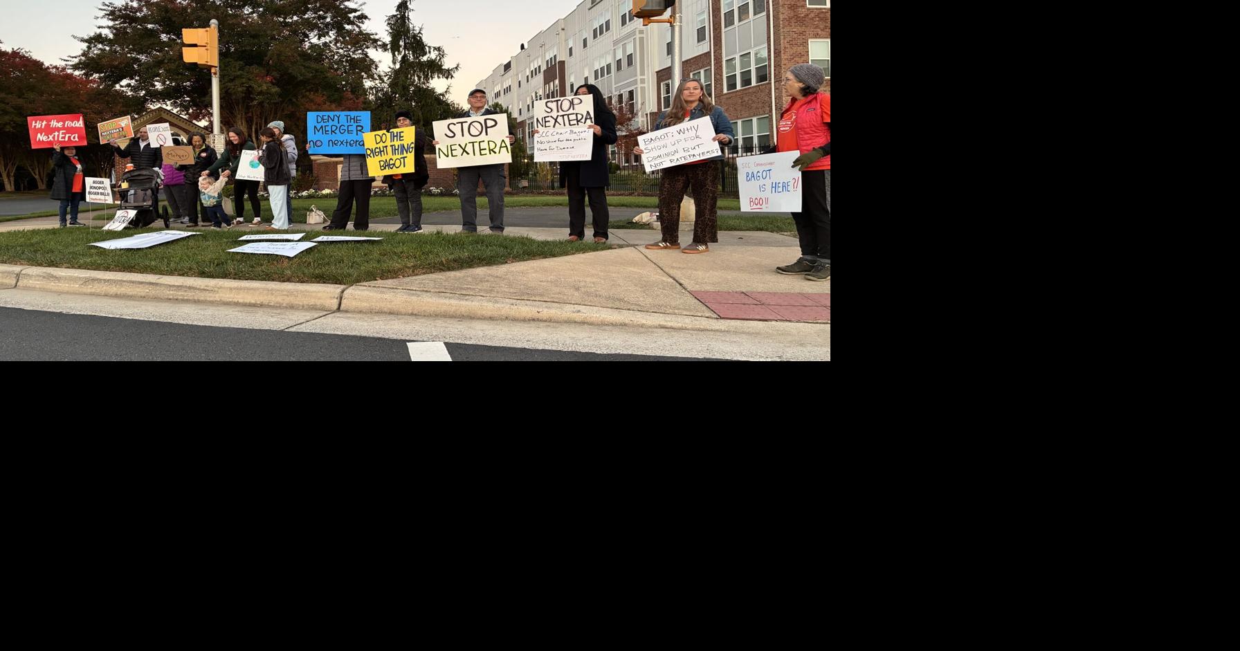 Business community gathers for energy panel as anti-merger protesters rally outside