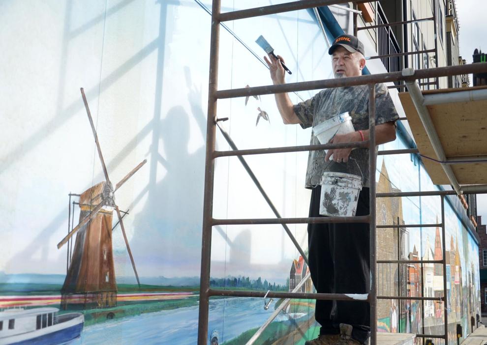 Artist updates his Seventh Street mural