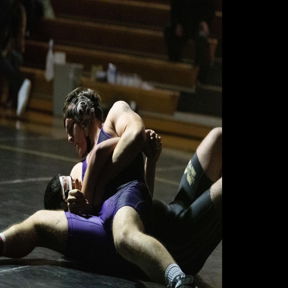 Wednesday's boys wrestling: Pins propel Pioneers over Trojans