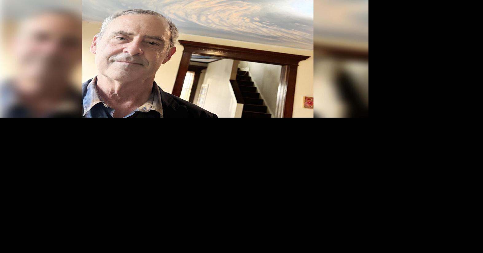 Lynden artist Neal Cronic paints ceiling murals