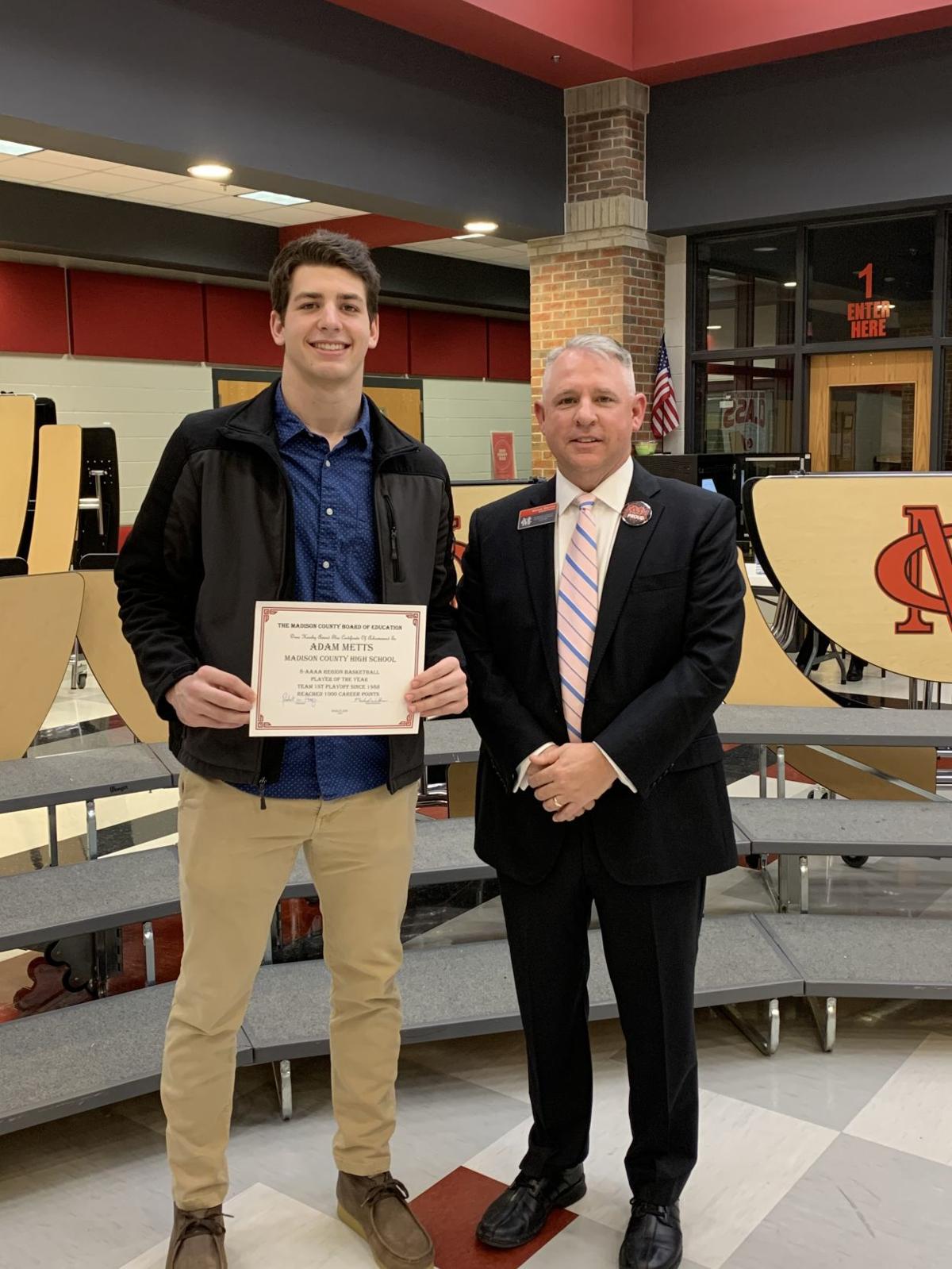 Metts honored at board meeting