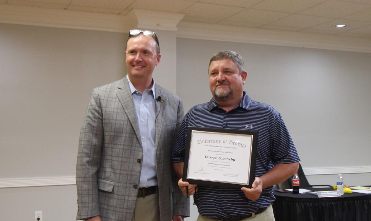 Owensby receives Certificate of Recognition