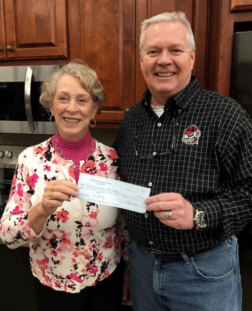 PHOTO: WBCT PRESENTS CHECK TO FOOD PANTRY