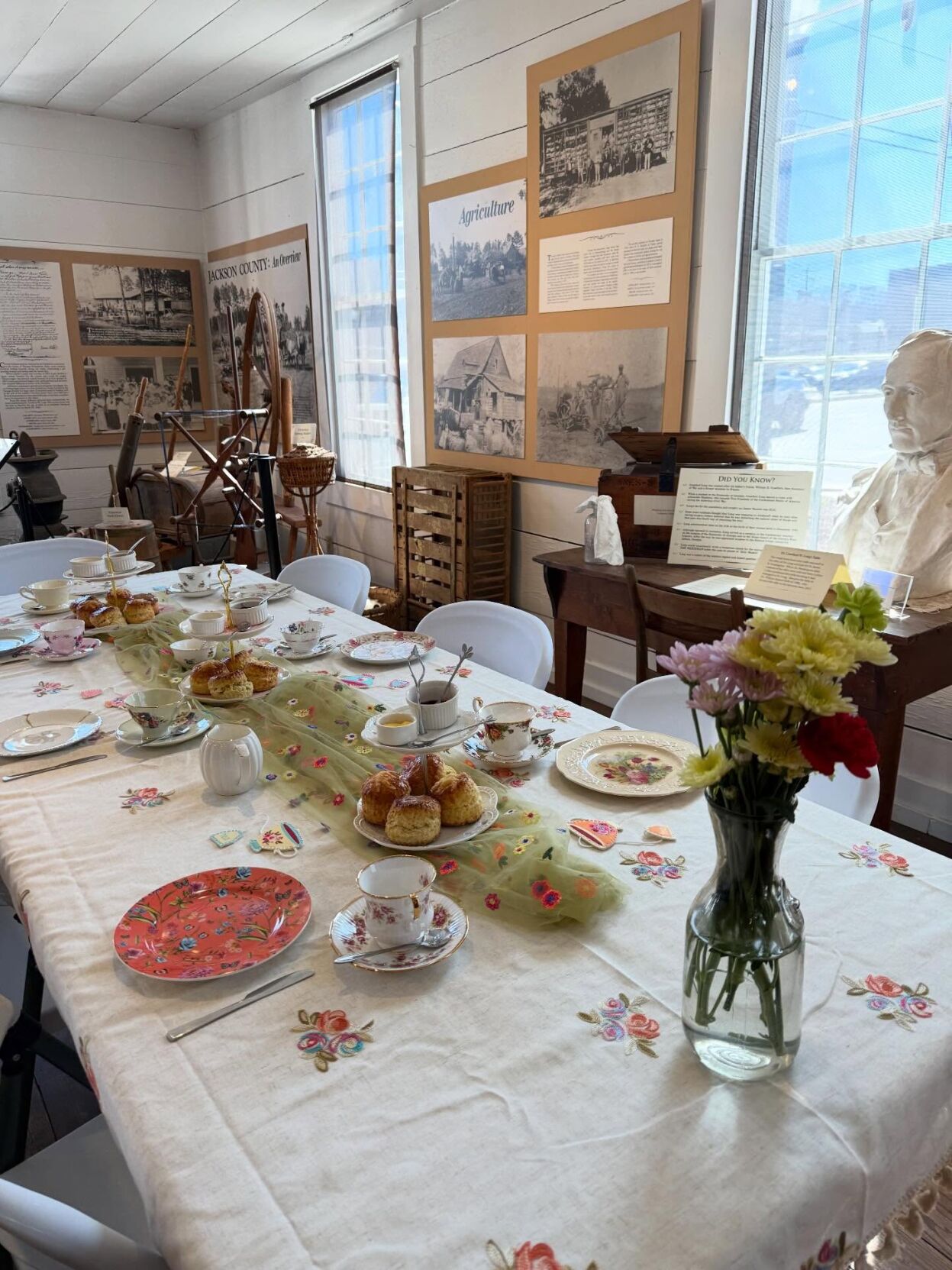 Guests enjoy tea and scones during British-style tea party at Crawford ...