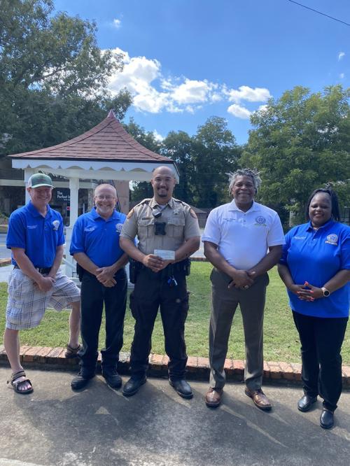 Hull donates to sheriff's office for Tasers