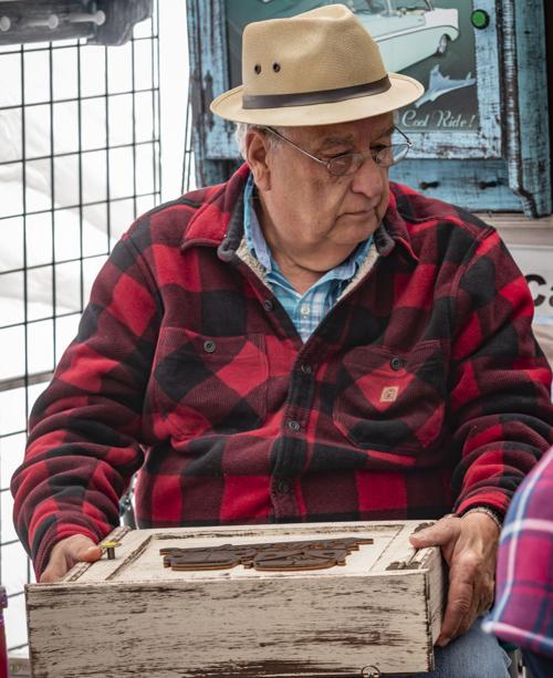 Unique wooden crafts sold at local fall festival