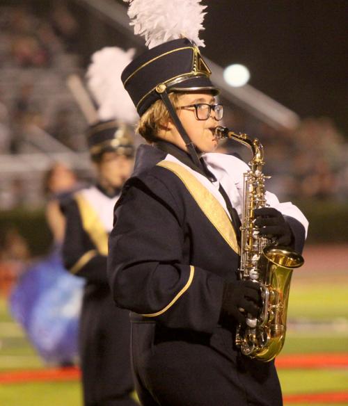 Harper plays saxophone