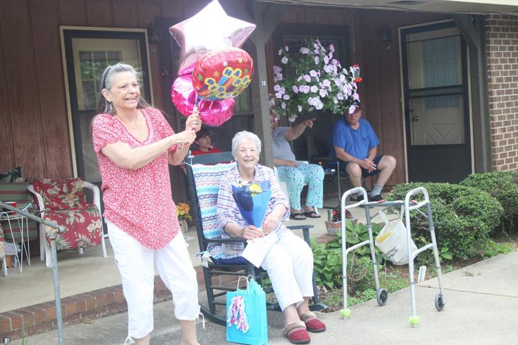 Driveby birthday event held for Virginia Epps Features