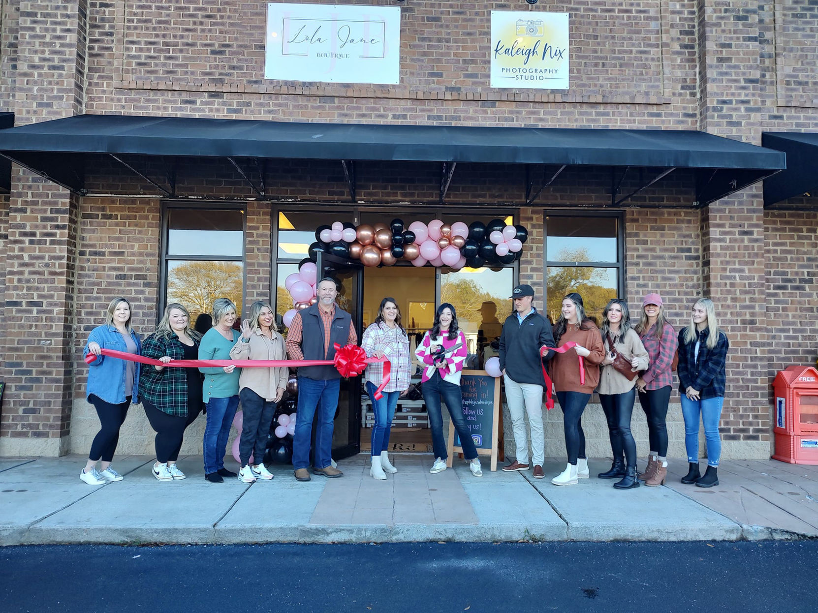 Ribbon cutting held for Lola Jane Boutique Features