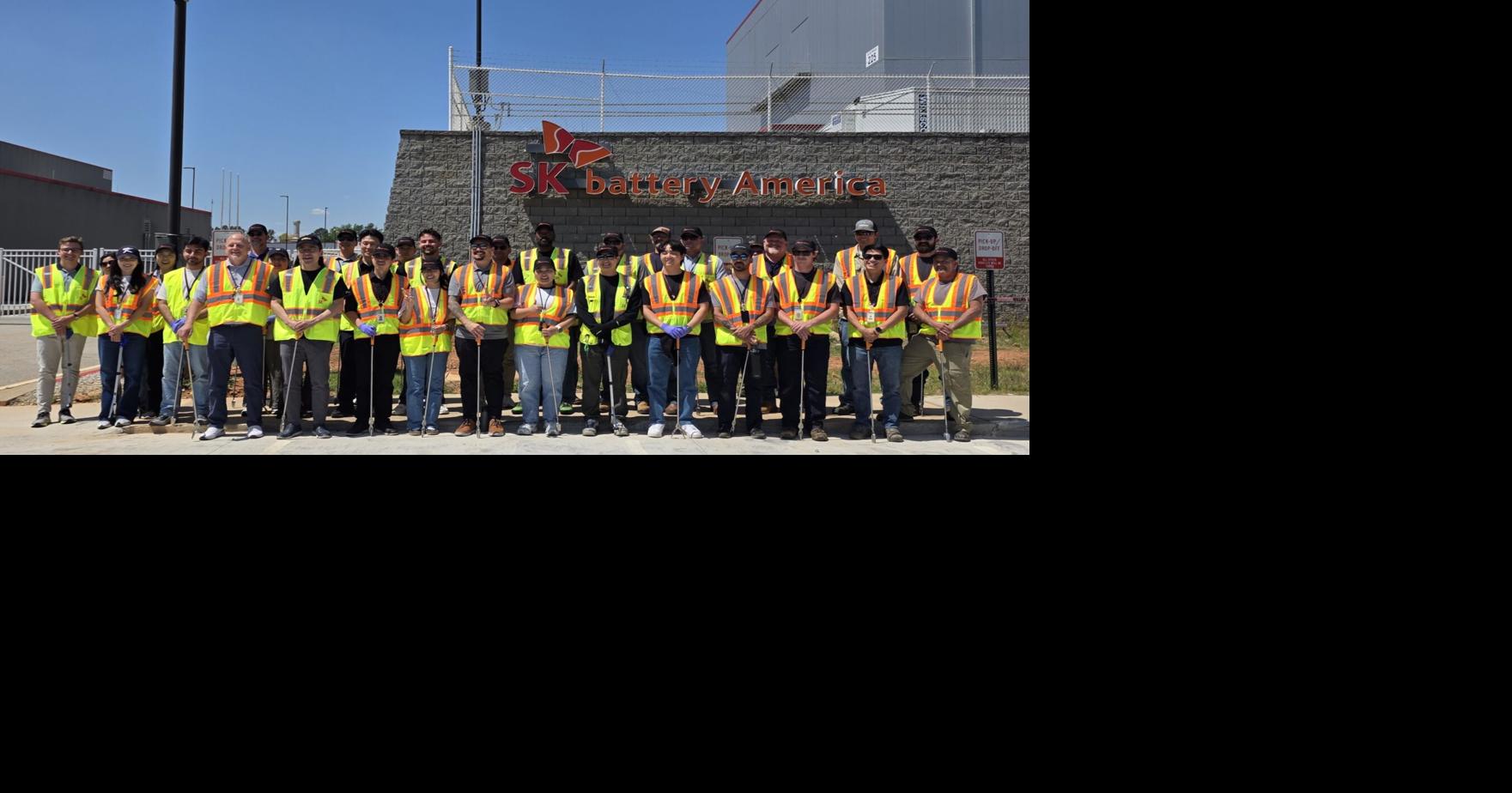 SK Battery America employees clean up SK Blvd. for Earth Day