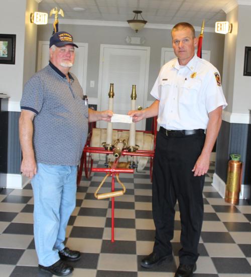 Local Woodmen chapter donates $300 to fire department