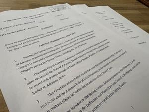 County sues Rockport over unpaid 911 costs