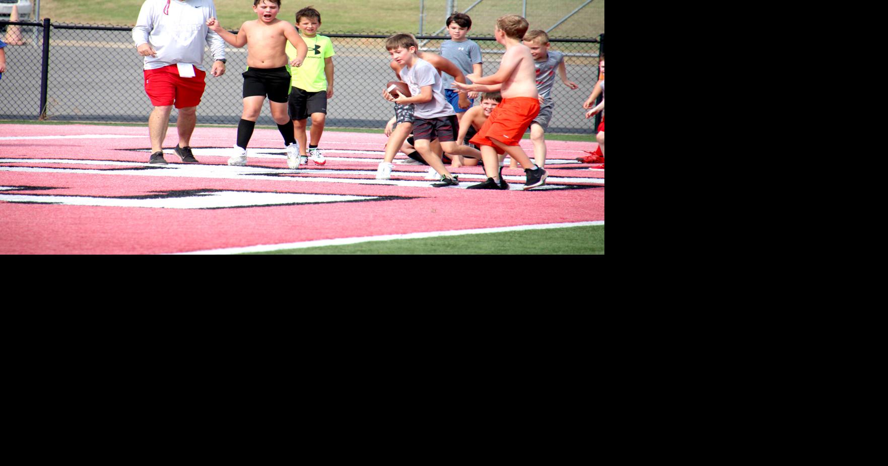 Glen Rose Football Youth Camp 2023 Youth football campers enjoy the