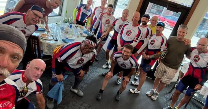 Cross country bike riders make lunch stop in Manchester