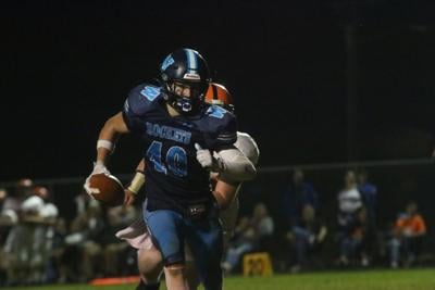Westwood rallies in the third to win conference title