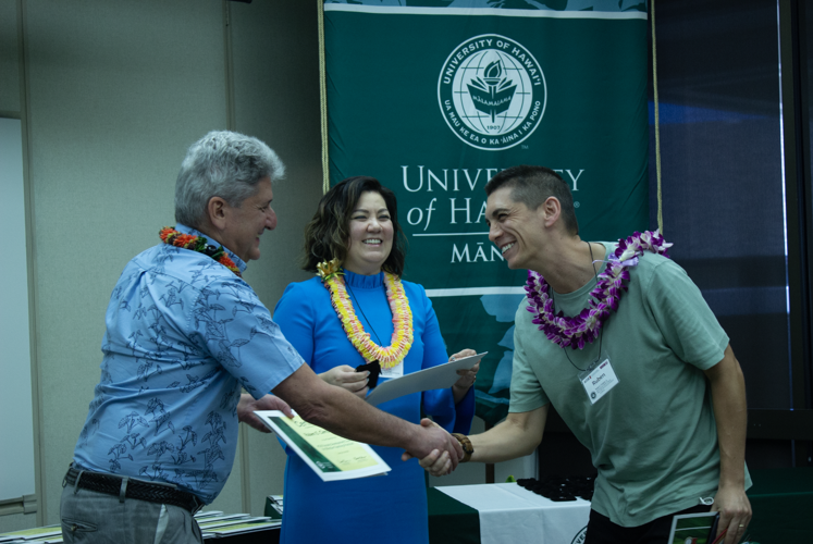 Pinning ceremony for ACUE Course in Effective Teaching Practices