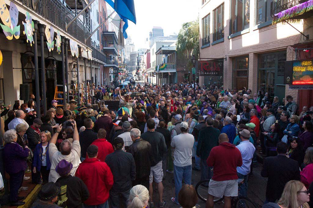 Mardi Gras tradition Greasing of the poles on Bourbon Street