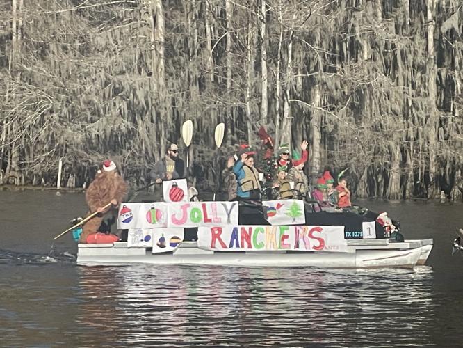 Uncertain Floating Christmas parade makes its way down Caddo Lake