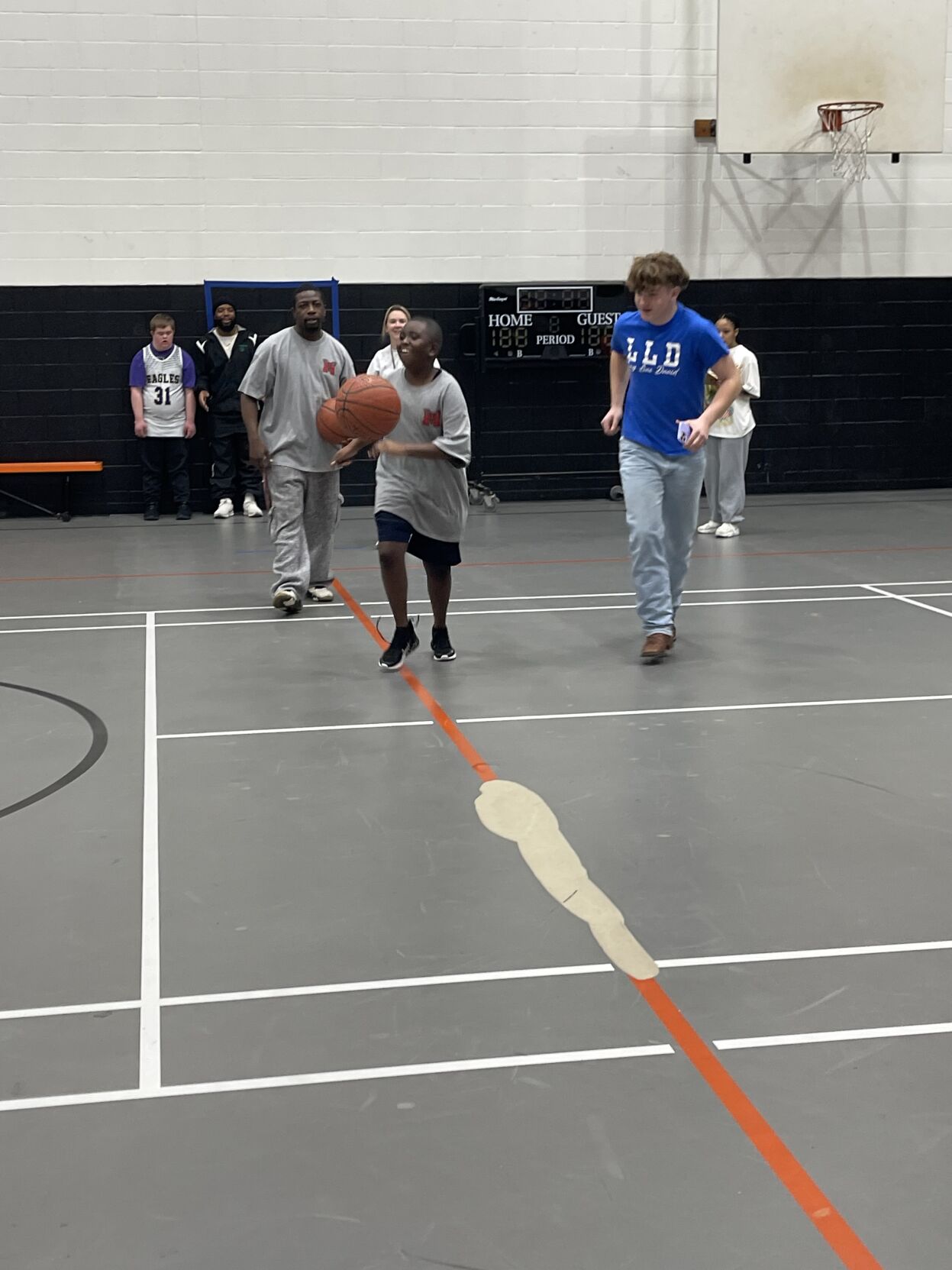 Marshall students score big at Gladewater Special Olympic basketball ...