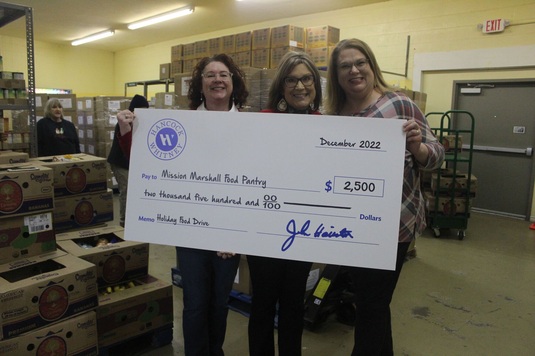 Bank donates to Mission Marshall s food pantry News