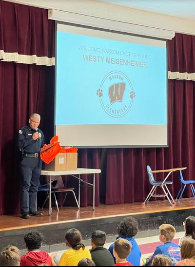 Waskom police visit with elementary school students