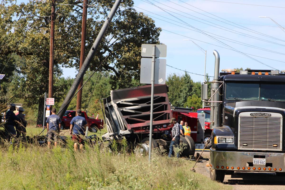 Wreck impedes traffic near Crossroads; truck driver loses