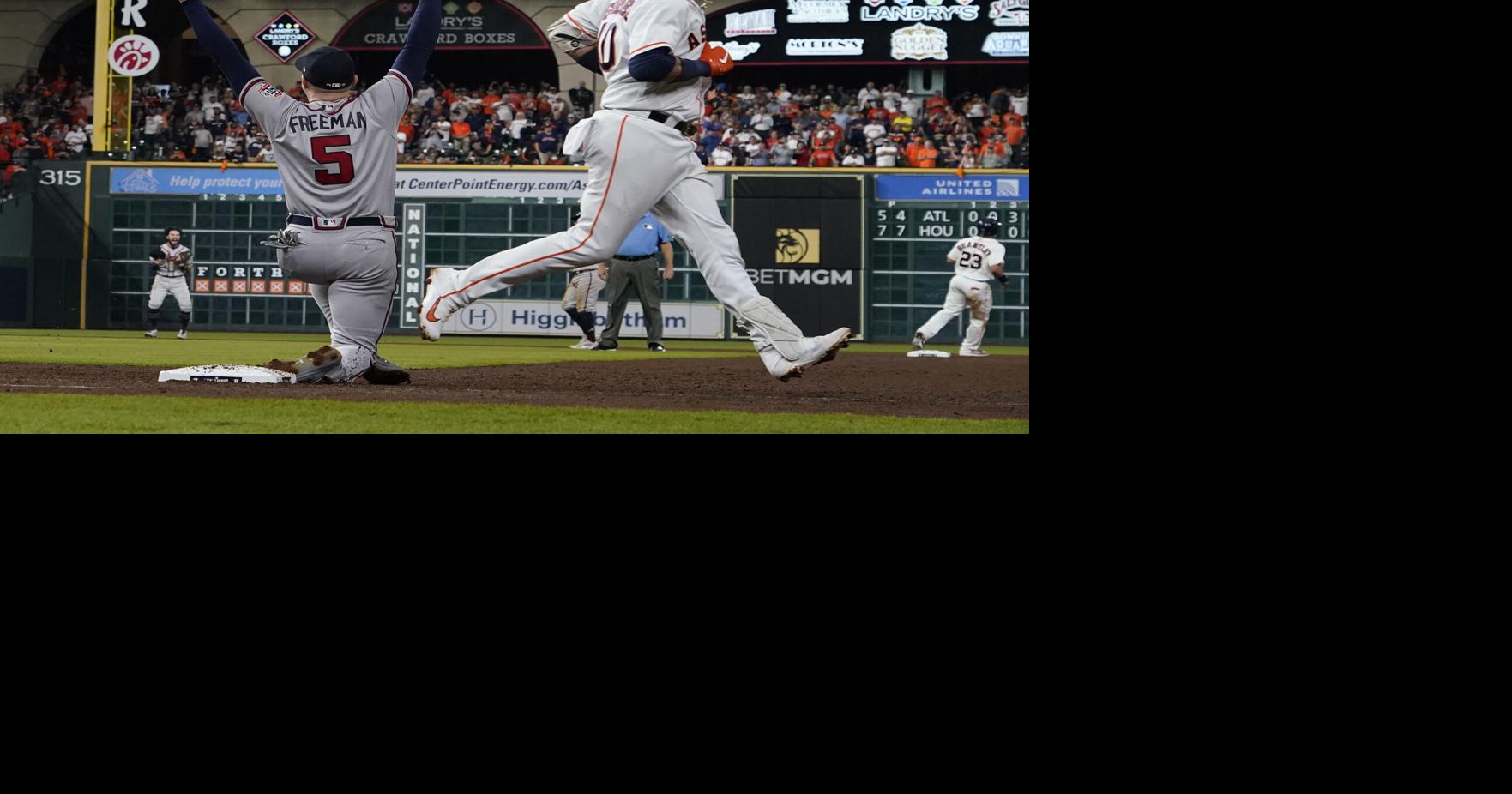 Houston, United States. 02nd Nov, 2021. Atlanta Braves first baseman Freddie  Freeman (5) celebrates solo homer with teammate Joc Pederson during the  seventh inning against the Houston Astros in game six in