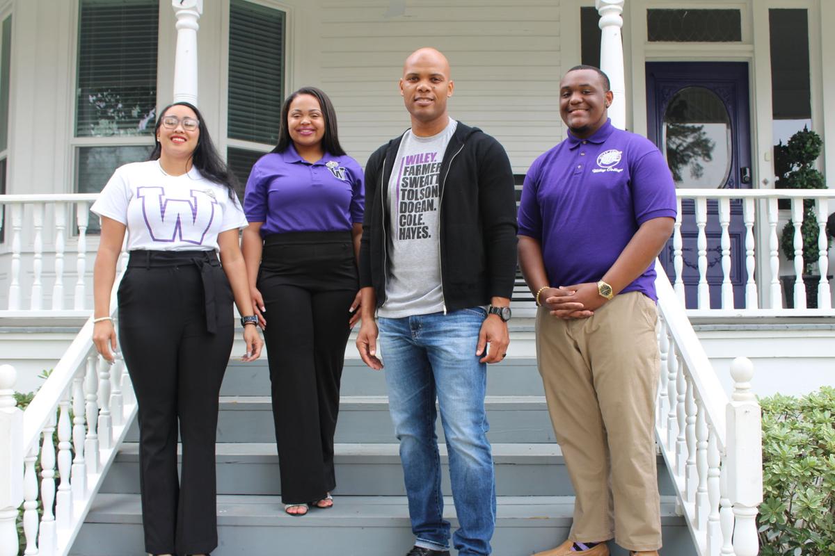 Progress Education New Wiley College President Herman Felton Jr. holds