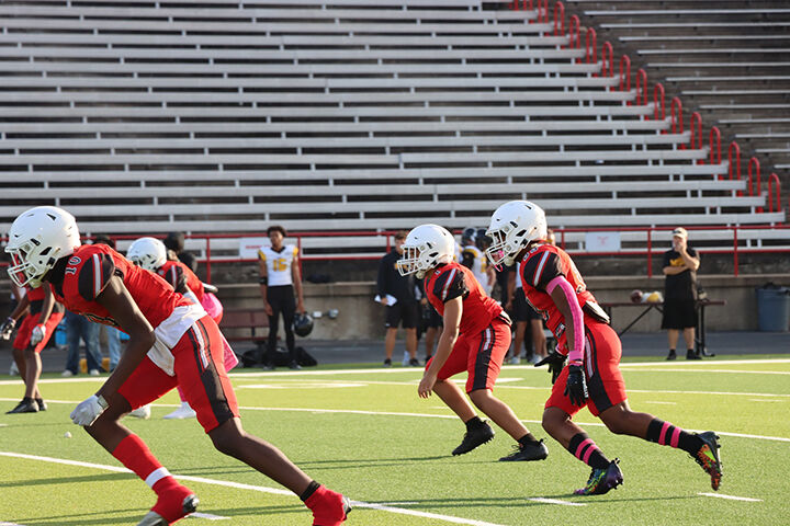 PHOTOS: Marshall, Elysian Fields Praise JV, Middle School Football ...