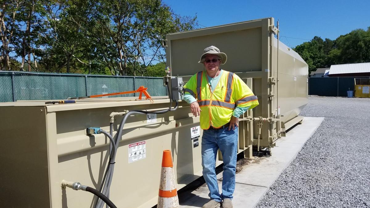 Henry County trash compactor