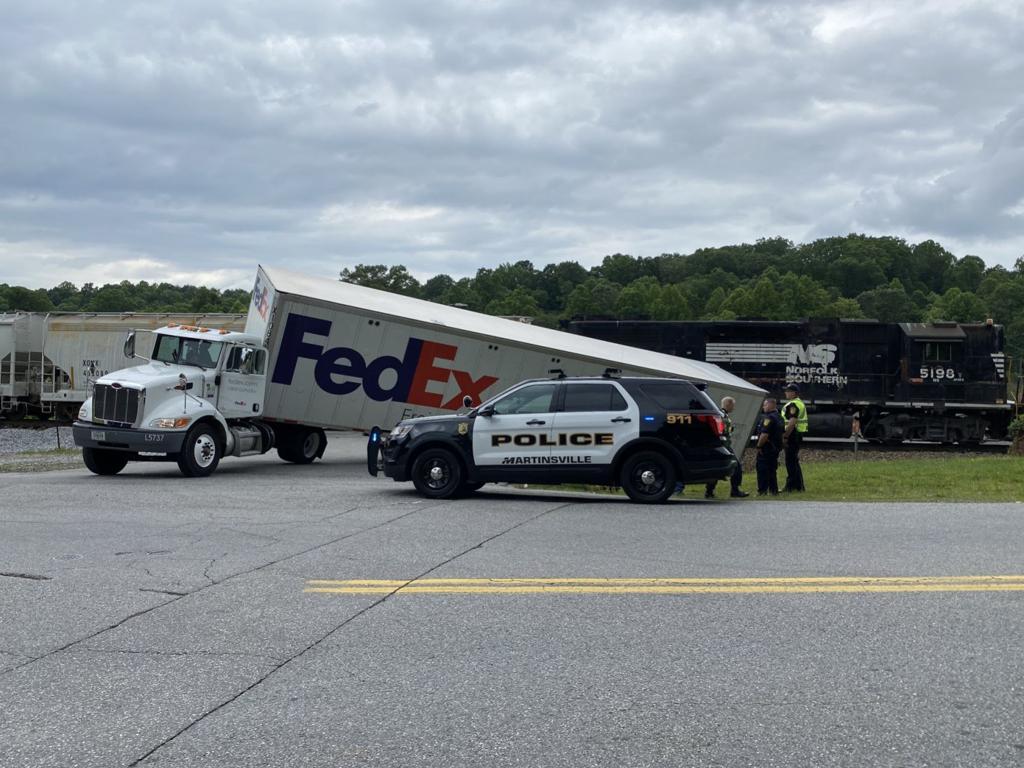 Watch Now Fedex Tractor Trailer And Norfolk Southern Train