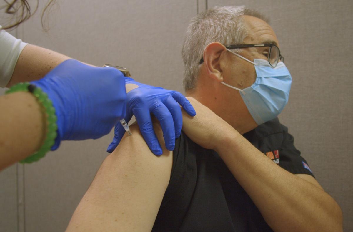 Dr. Richard Galos receives vaccine - Martinsville