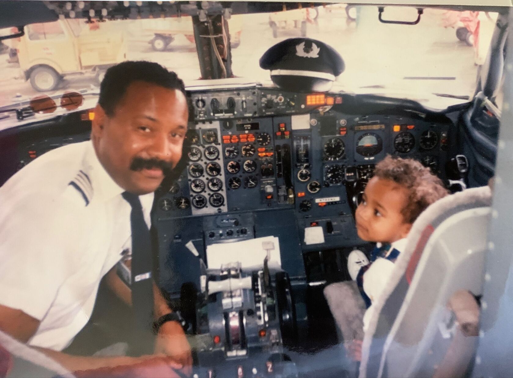 Pilot dad, son re-create photo 30 years later