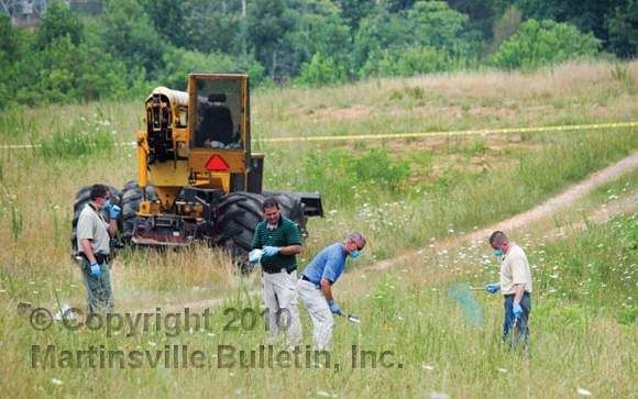 Worker finds woman's body in Ridgeway field
