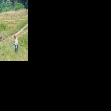 Worker finds woman's body in Ridgeway field